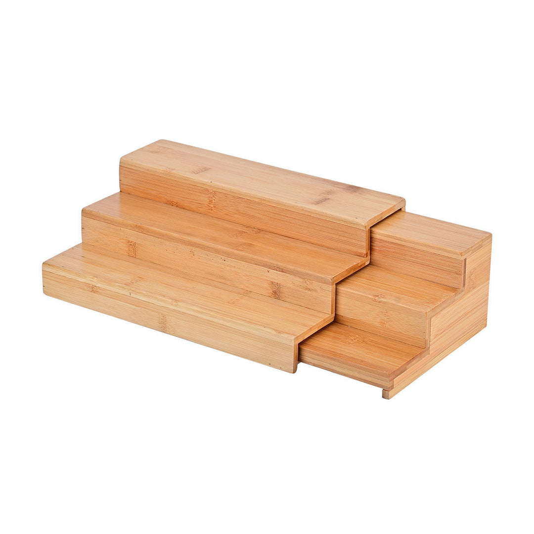 Ξύλινη βάση τριών επιπέδων από bamboo σε ανοιχτόχρωμο φυσικό τόνο, με δυνατότητα επέκτασης για μεγαλύτερο χώρο αποθήκευσης.
