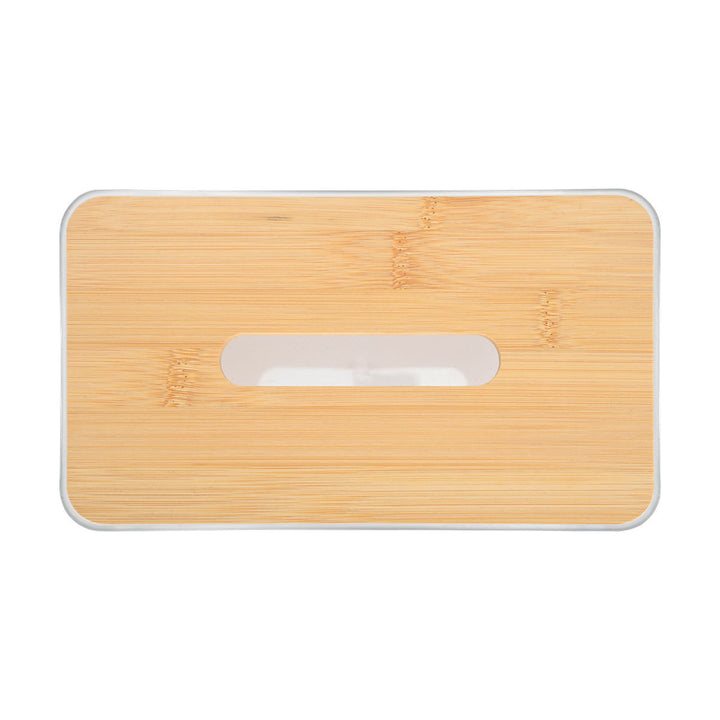 Κοντινό πλάνο σε θήκη χαρτομάντηλων Bamboo Essentials με φυσικό bamboo καπάκι και διάφανες λεπτομέρειες.