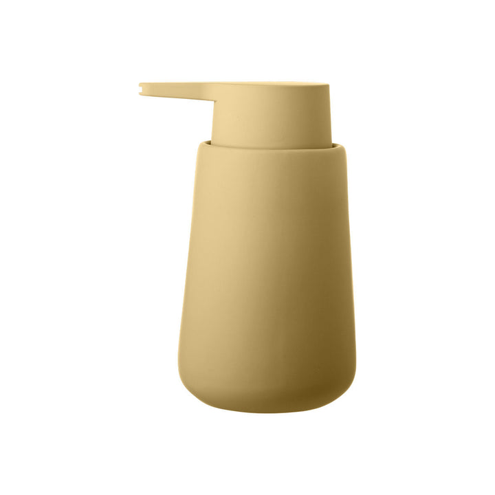 Μπεζ dispenser μπάνιου με μαλακή ματ επιφάνεια και minimal ύφος, σε καθαρό φόντο. Ζεστή απόχρωση που δένει όμορφα με φυσικές υφές.