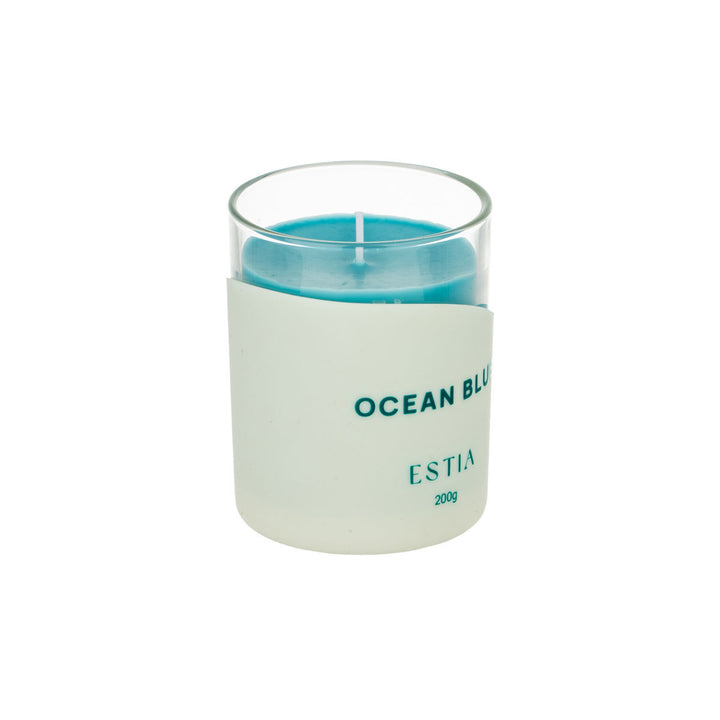Αρωματικό κερί Ocean Blue της Estia με δροσερή θαλασσινή αισθητική και κομψή γυάλινη συσκευασία.