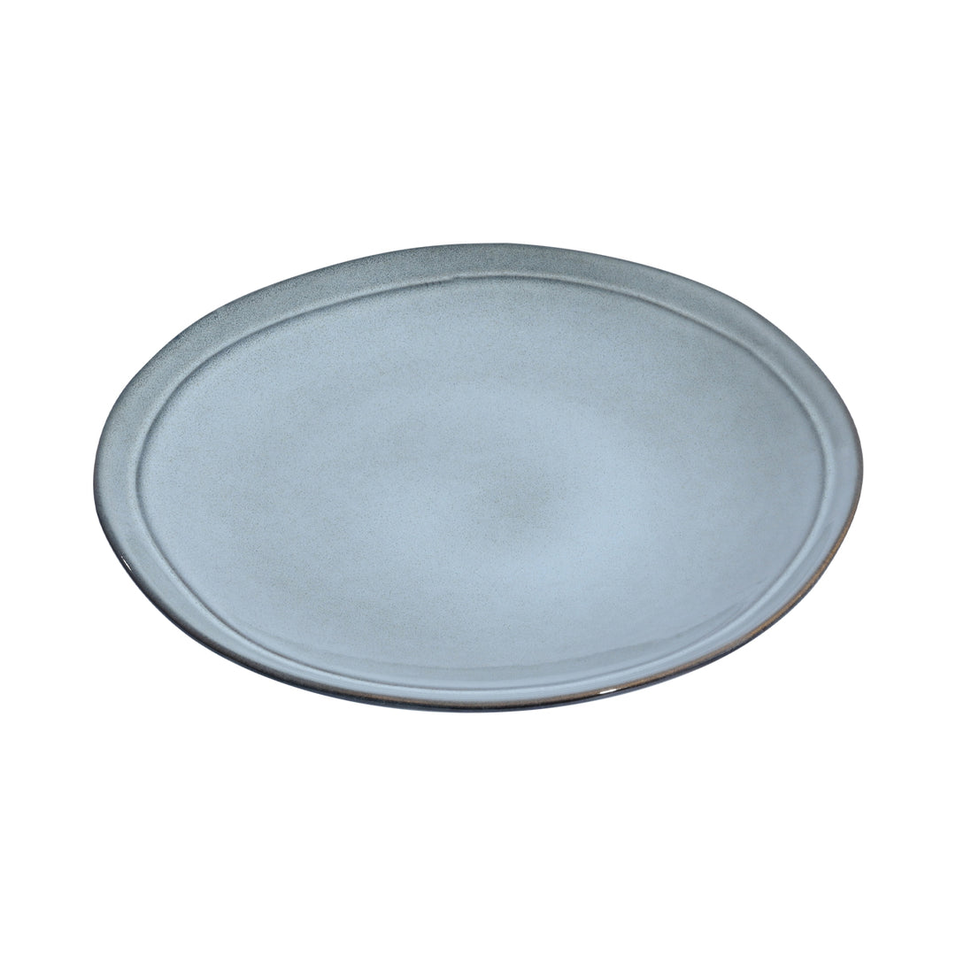 Ρηχό πιάτο stoneware Estia Deline σε μπλε απόχρωση Pacific με ακανόνιστο στρογγυλό σχήμα.