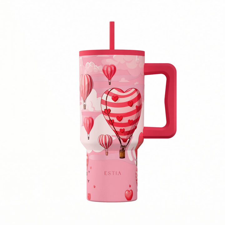 Θερμός Straw Tumbler XL Estia με ροζ σχέδιο από καρδιές και αερόστατα, εργονομική λαβή και καλαμάκι.
