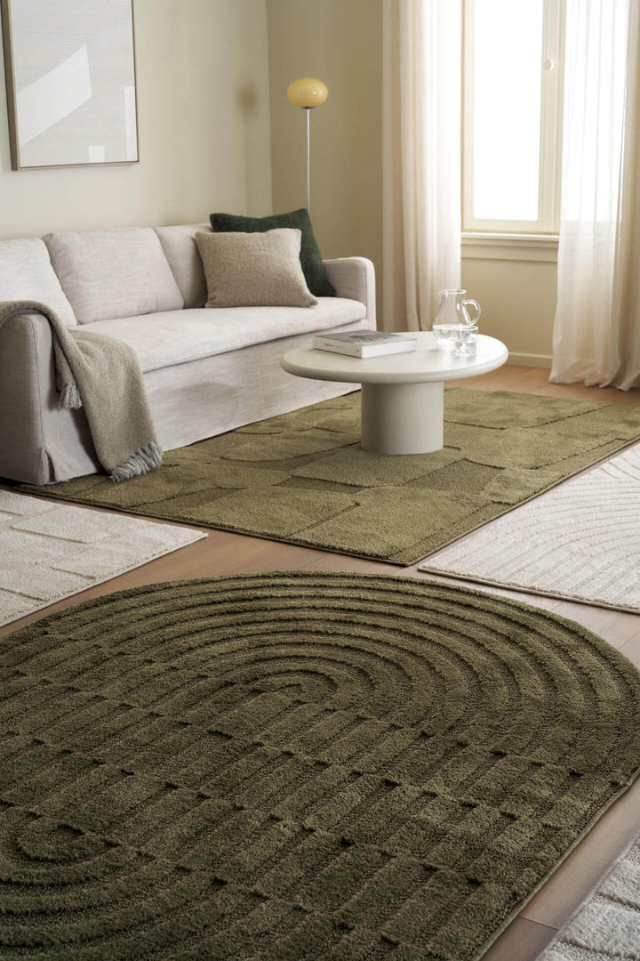 Χαλί Jazz της Royal Carpet σε λαδί, σε διαφορετική όψη, με προσεγμένο σχέδιο της σειράς και εμφανή υφή επιφάνειας.