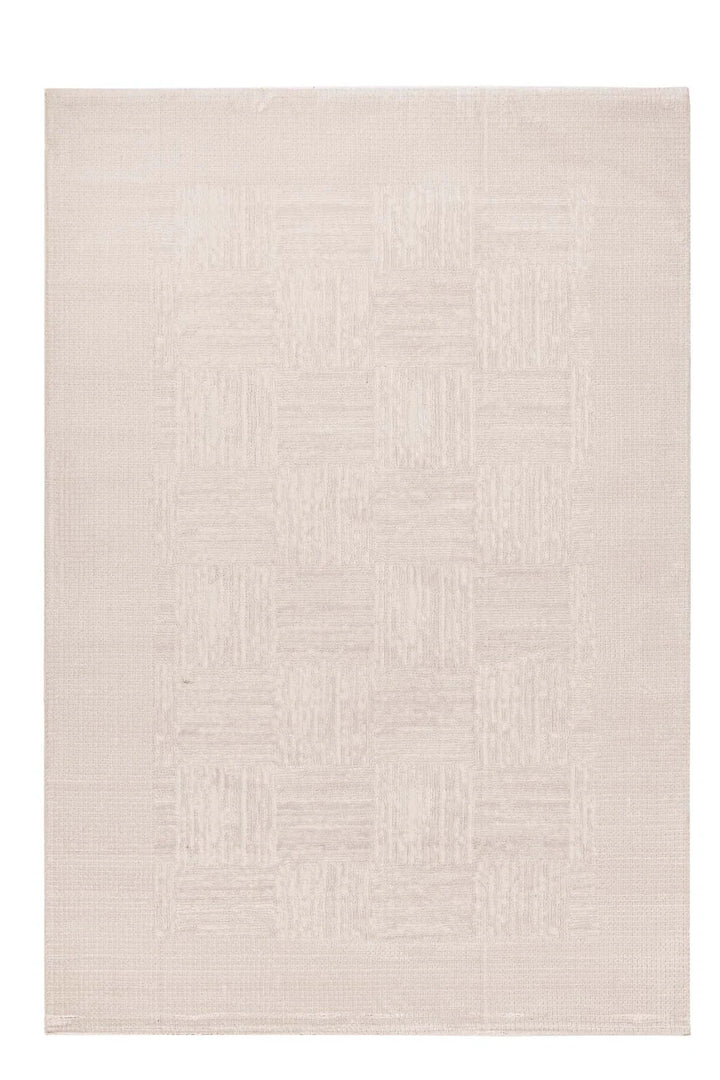 Μοντέρνο εκρού χαλί Bianca Royal Carpet με ανάγλυφο γεωμετρικό σχέδιο σε minimal αισθητική και ουδέτερο φόντο.