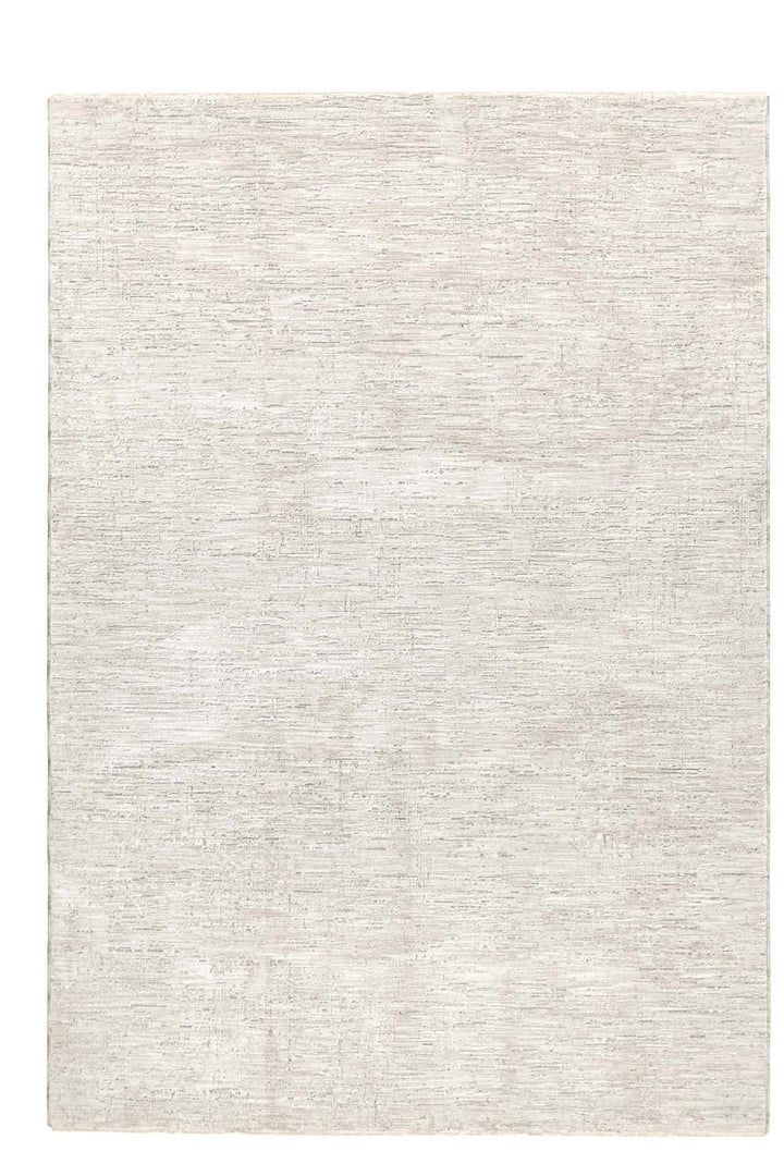 Μονόχρωμο λευκό χαλί Prime Royal Carpet με διακριτικό textured σχέδιο σε ουδέτερο φόντο.